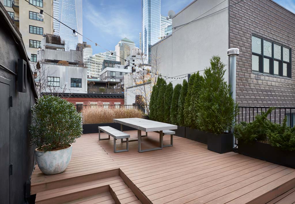 cocoon boto 800 square foot rooftop deck with plants and hanging lights cocoon boto 800 square foot rooftop deck with plants and hanging lights