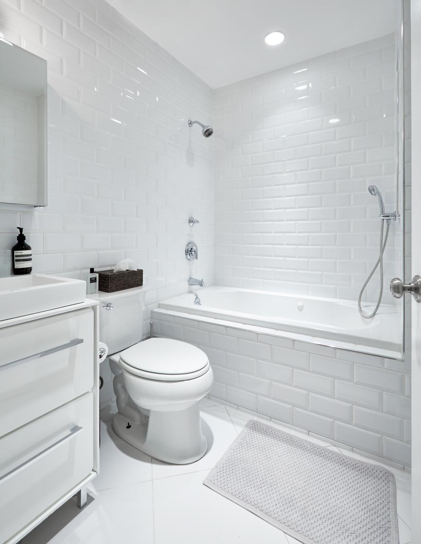 cocoon boto Bathroom with white tile walls deep soaking bathtub and rainfall shower cocoon boto Bathroom with white tile walls deep soaking bathtub and rainfall shower