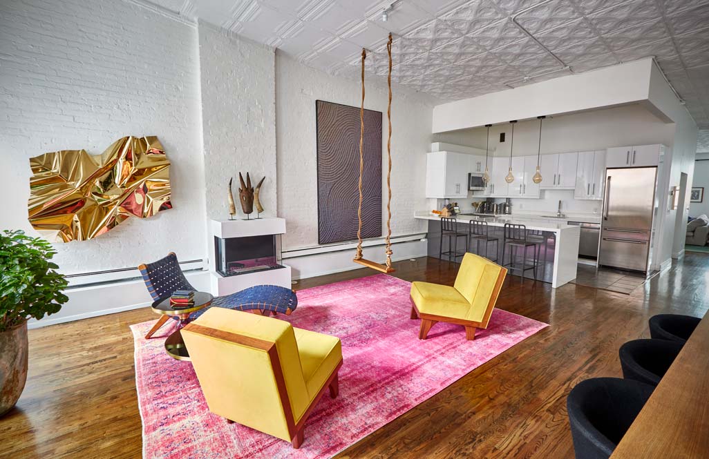 cocoon boto Living room with 12 feet to 14 feet high ceilings white walls glass fireplace living room swing and unique art cocoon boto Living room with 12 feet to 14 feet high ceilings white walls glass fireplace living room swing and unique art