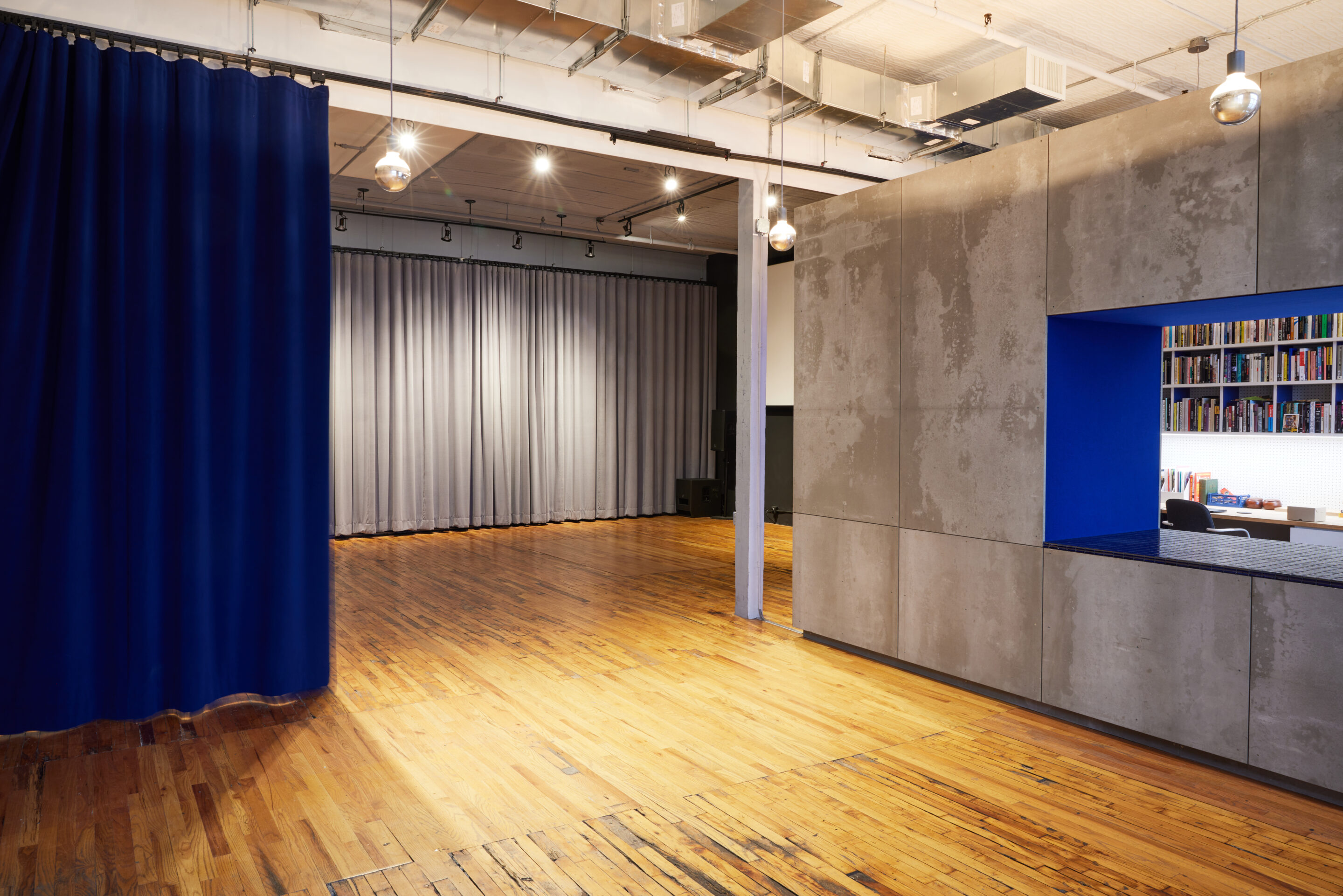 Casa Kino event space with hanging curtain divider Casa Kino event space with hanging curtain divider