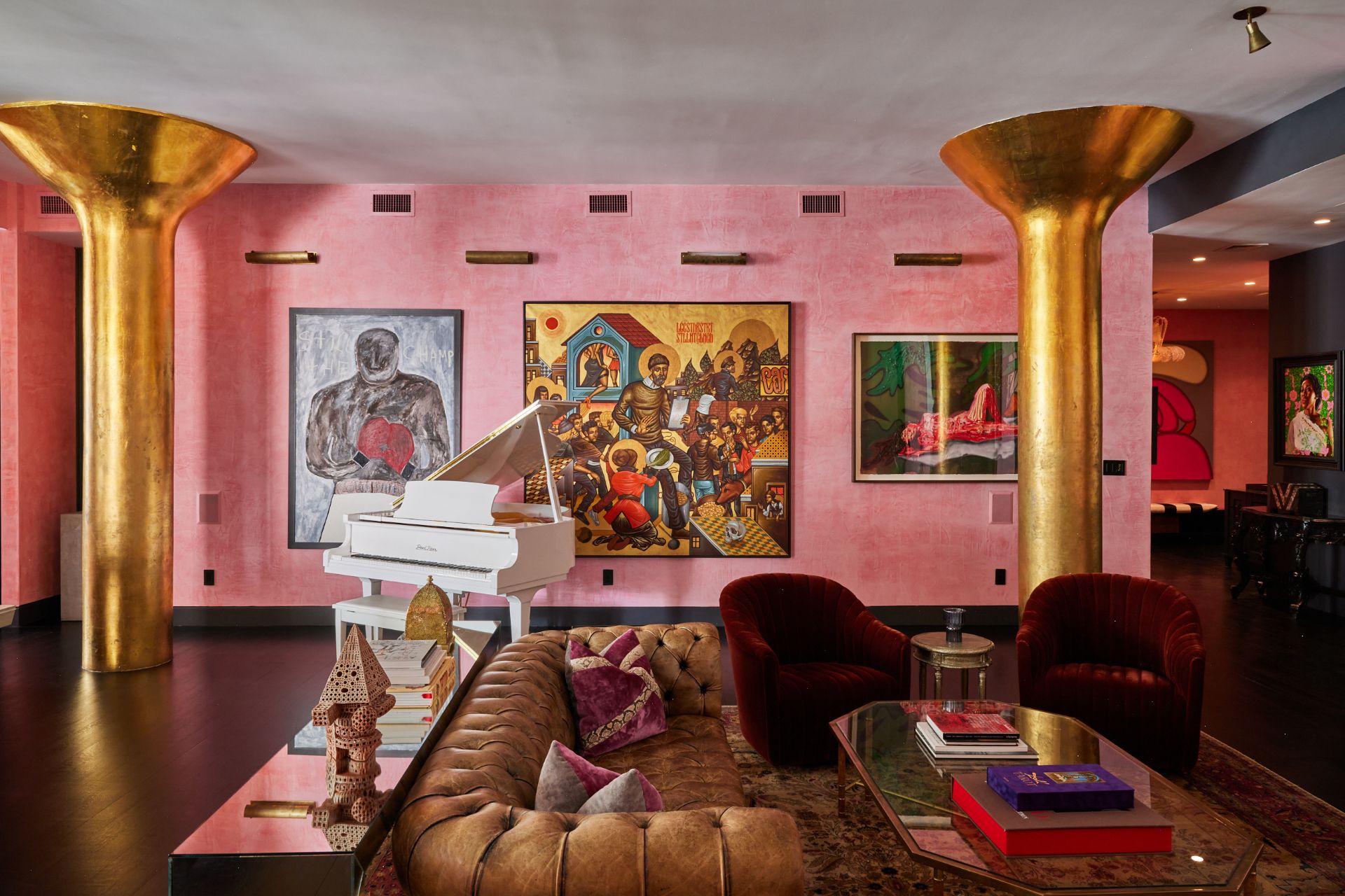 Casa Maxima 8 Living Space with Gold Columns, Wall Art, Grand Piano, and Pink Venetian Plaster Throughout Casa Maxima 8 Living Space with Gold Columns, Wall Art, Grand Piano, and Pink Venetian Plaster Throughout