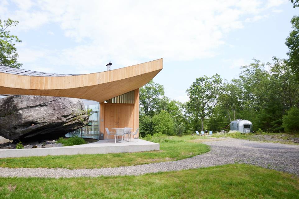 cocoon casa cometa diagonal view house built around huge natural rock3 cocoon casa cometa diagonal view house built around huge natural rock3