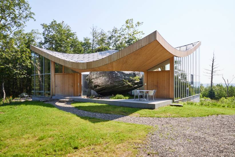 cocoon casa cometa diagonal view house built around huge natural rock7 cocoon casa cometa diagonal view house built around huge natural rock7