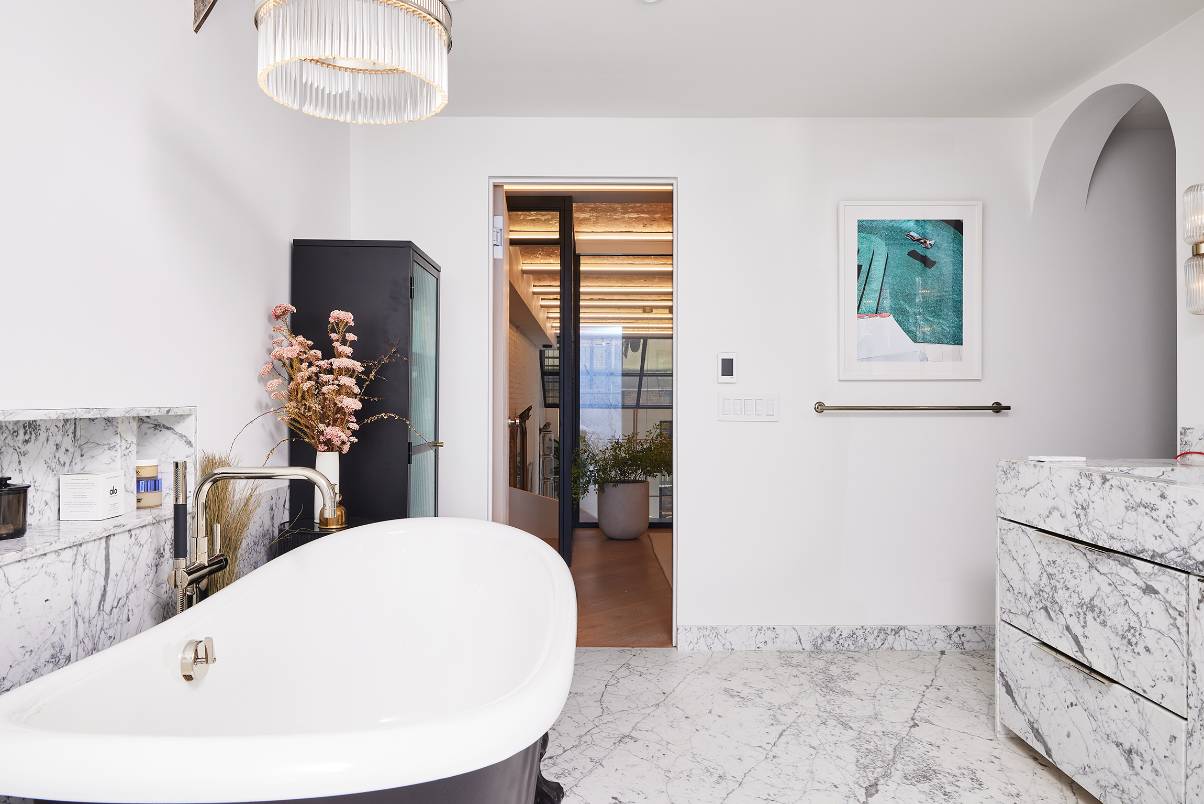 cocoon casa strand master marble bathroom back view chandelier details doors closed cocoon casa strand master marble bathroom back view chandelier details doors closed