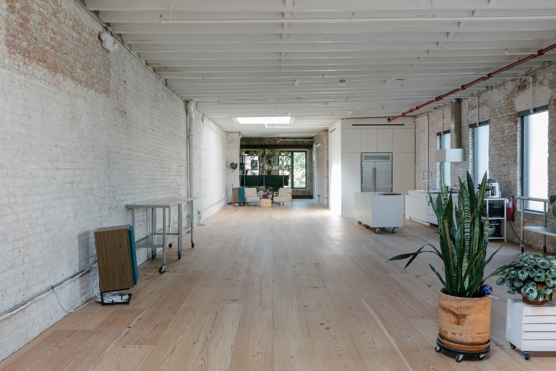 cocoon casa adria studio open layout back view Back view of the open studio layout at Casa Adria, showcasing a spacious and modern design for photo, video, or lifestyle-focused productions.
